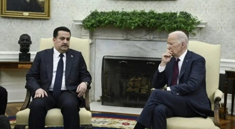 1713208768 Irak Basbakani konustu Joe Biden saatiyle oynadi